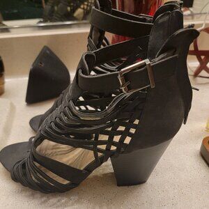 Black back-zip heeled boots